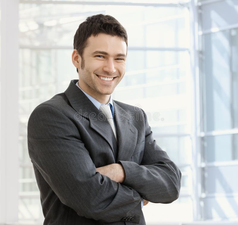 Happy businessman smiling