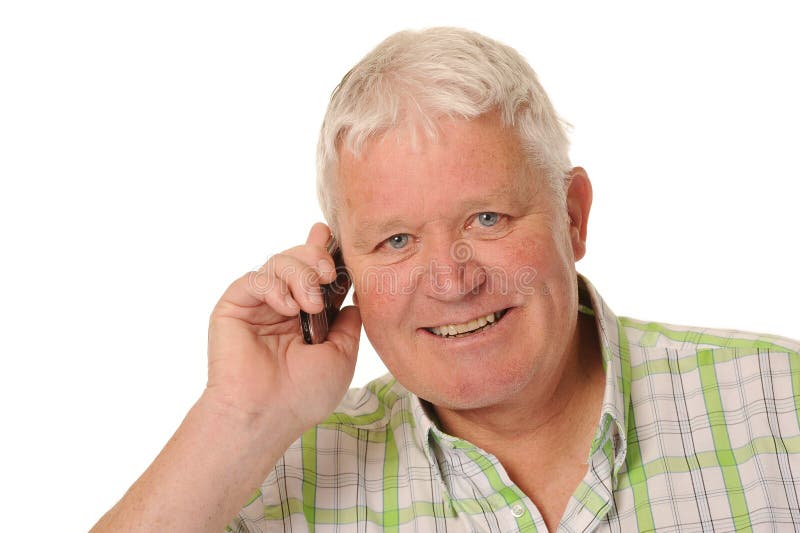 Happy casual mature man using mobile phone