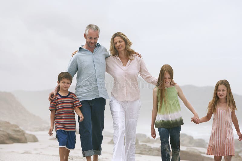 Happy Caucasian Family On Beach