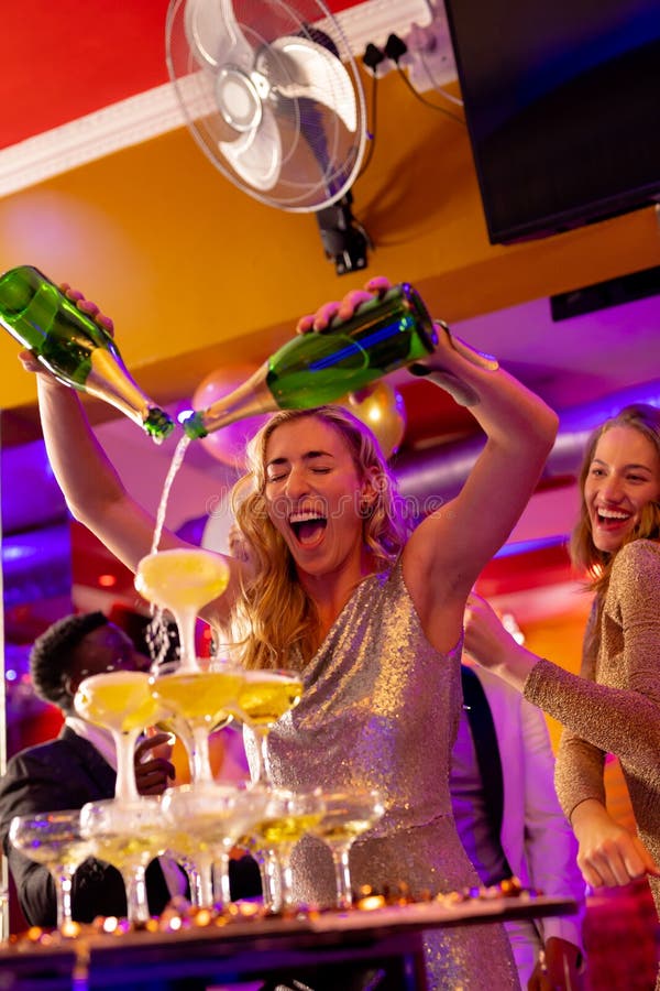 https://thumbs.dreamstime.com/b/happy-caucasian-woman-pouring-champagne-fountain-glasses-diverse-friends-nightclub-happy-caucasian-women-pouring-261464456.jpg