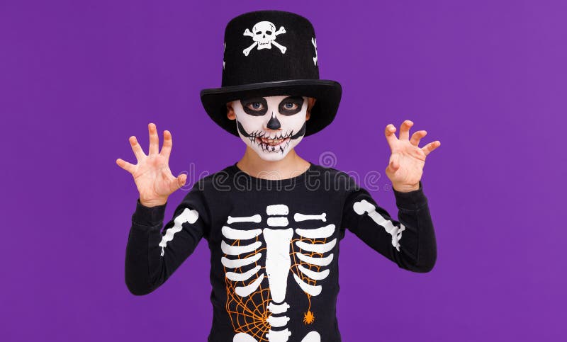 Happy Cheerful Boy in Skeleton Costume Celebrates Halloween and Make ...