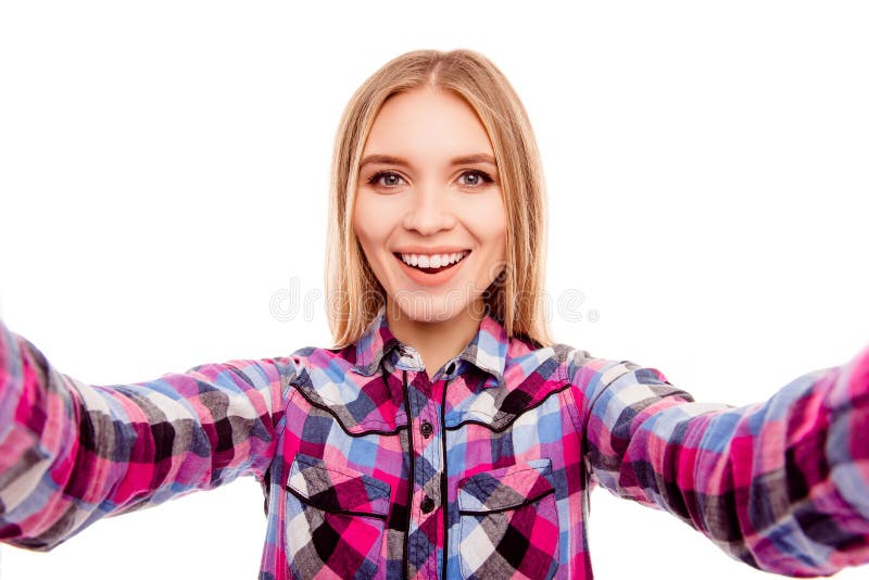 Happy cheerful young blonde woman making selfie royalty free stock image Happy cheerful young blonde woman making selfie royalty free stock image
