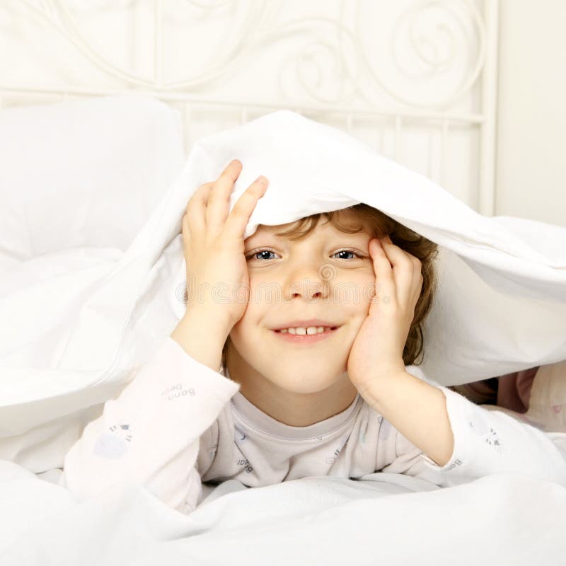 Happy child in the bed