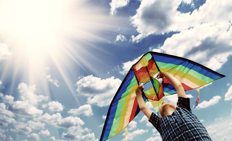 Happy child flies a kite in the sky 2 royalty free stock photography Happy child flies a kite in the sky 2 royalty free stock photography