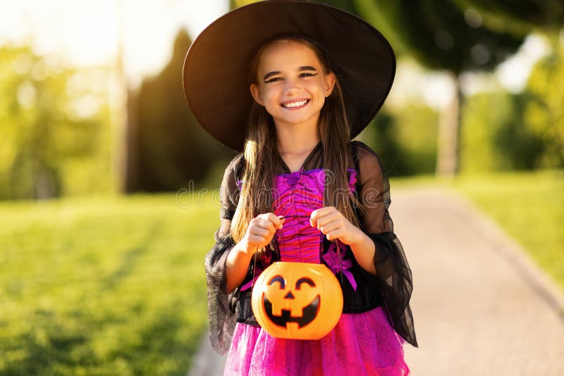 Happy Child Girl in a Carnival Costume and with Bucket on Halloween ...