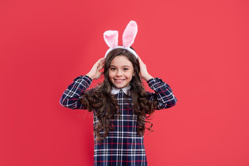 Happy child girl in easter bunny ears having fun, happy easter royalty free stock photos