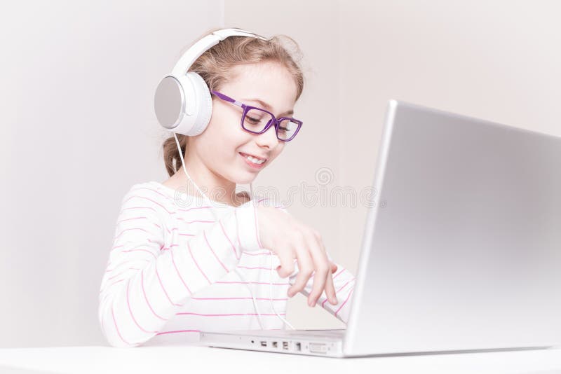 Young Girl Looking at Laptop Screen Stock Image - Image of listens ...