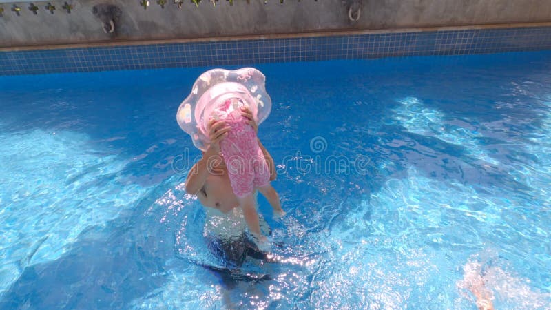 Happy Child Girl Swimming in the Pool in Summer Day. Family Summer Vacation. Stock Video - Video of girl, adorable: 191292891