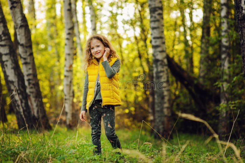 Happy children exploring nature on a guided tour
