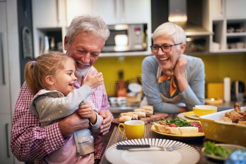 Download Grandpa Persuading His Granddaughter To Eat Carrot ...