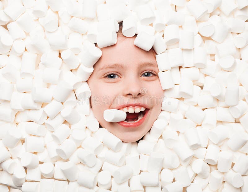 Happy Kid Lying in Marshmallows Stock Photo - Image of portrait, studio ...