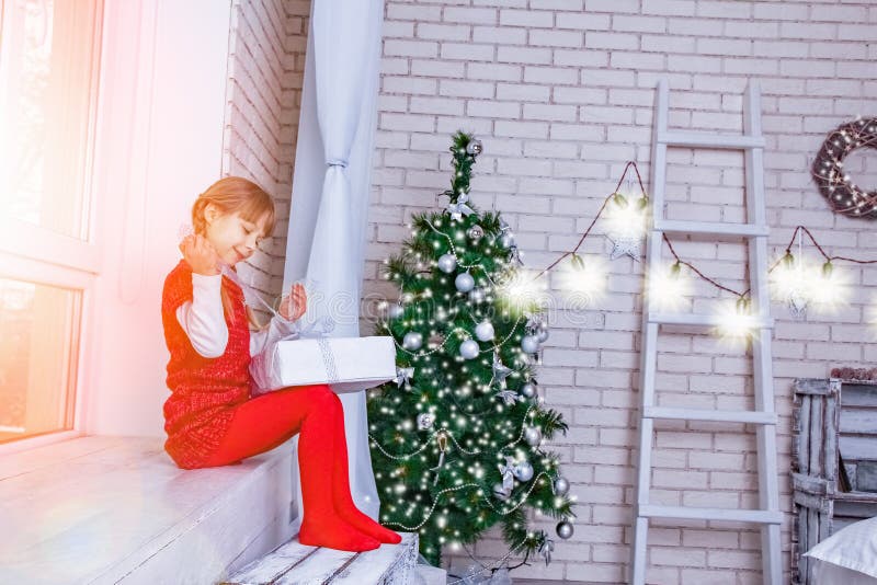 Happy child playing at christmas at home