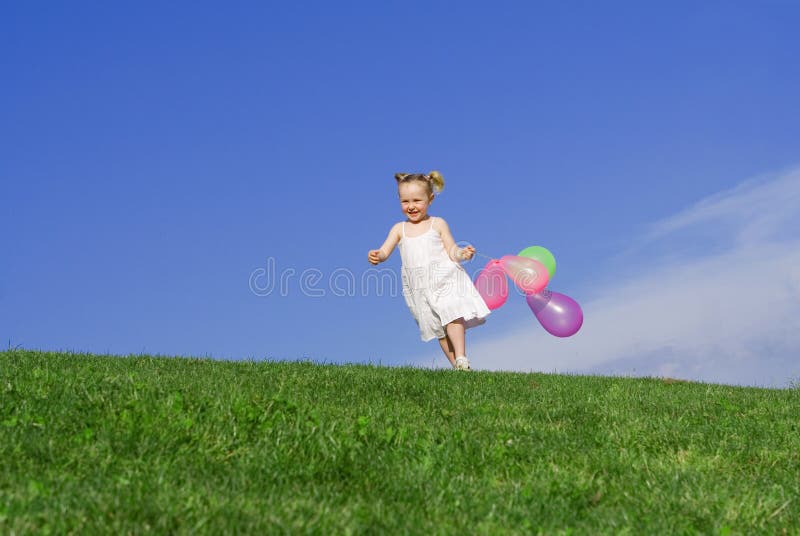 Happy child playing outdoors