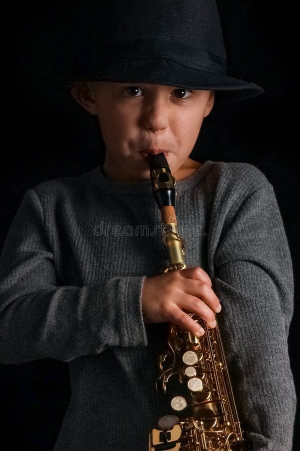Happy Child Plays Saxophone in Studio Stock Image Image of elegant