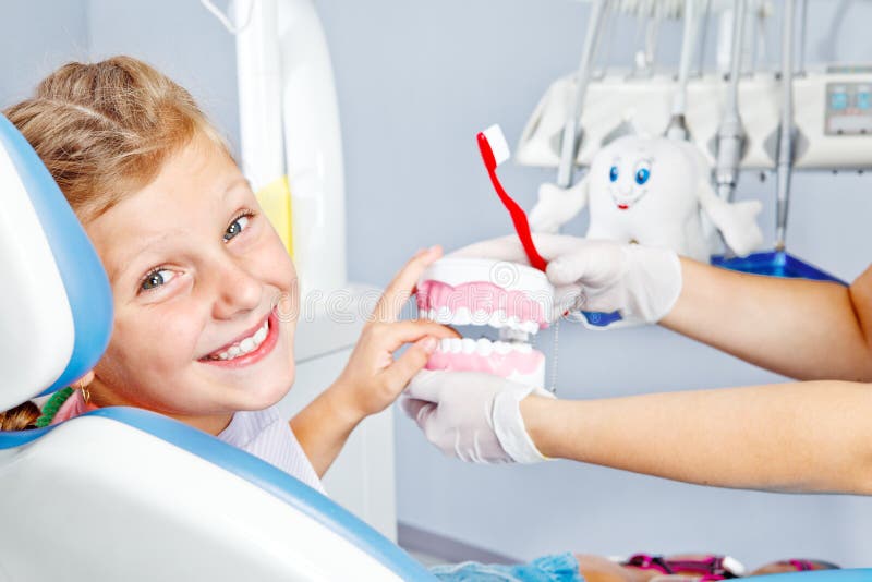 Happy child with toy dentures