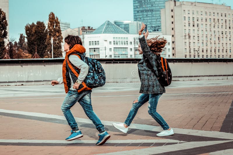 Positive Delighted Best Friends Having Active Interaction Stock Photo ...