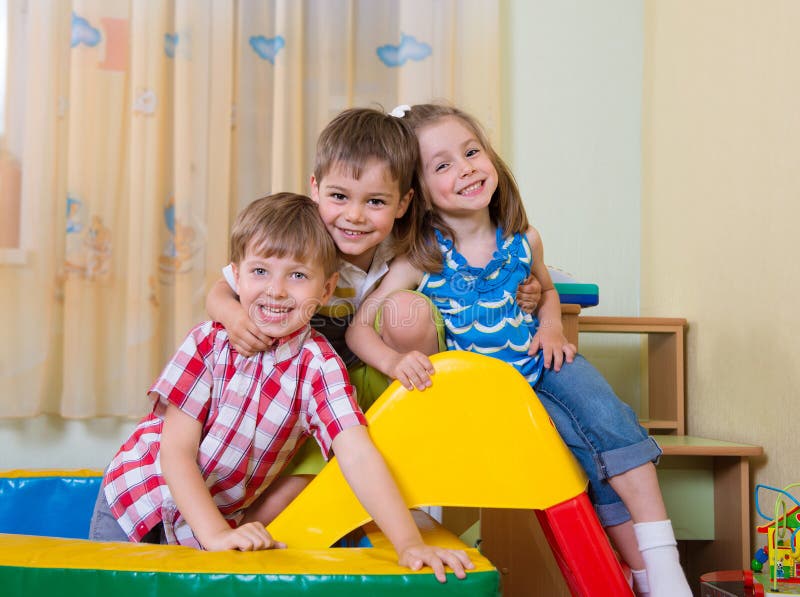 Happy children having fun at home royalty free stock photos