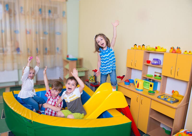 Happy children having fun at home stock photo