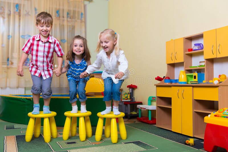 Happy children having fun at home stock photos