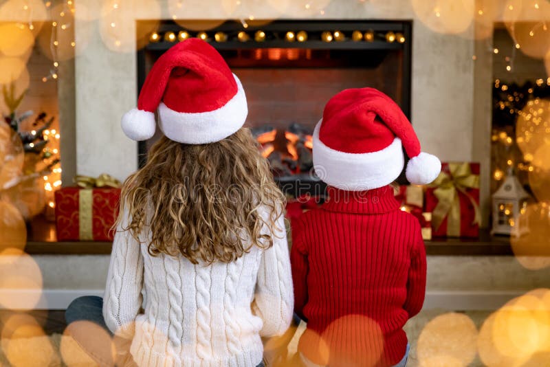 Happy Children Near Fireplace at Christmas Stock Image - Image of ...