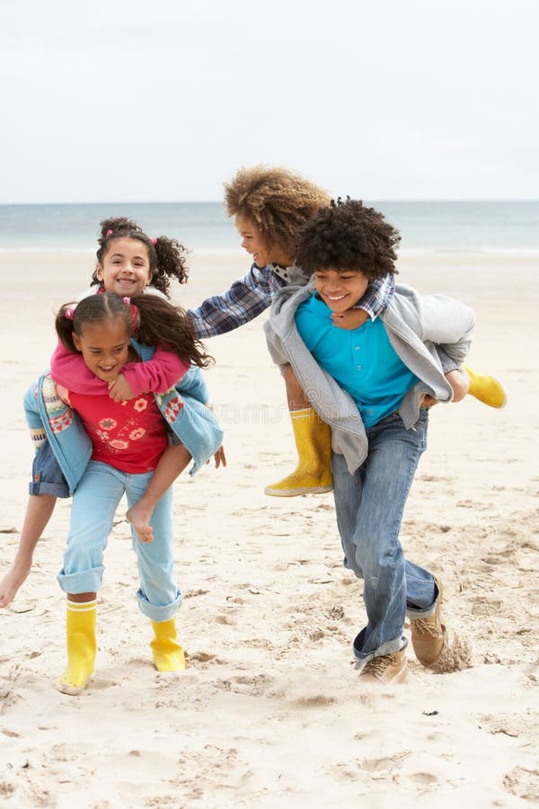 African American Children Playing at the Beach Stock Photo - Image of ...