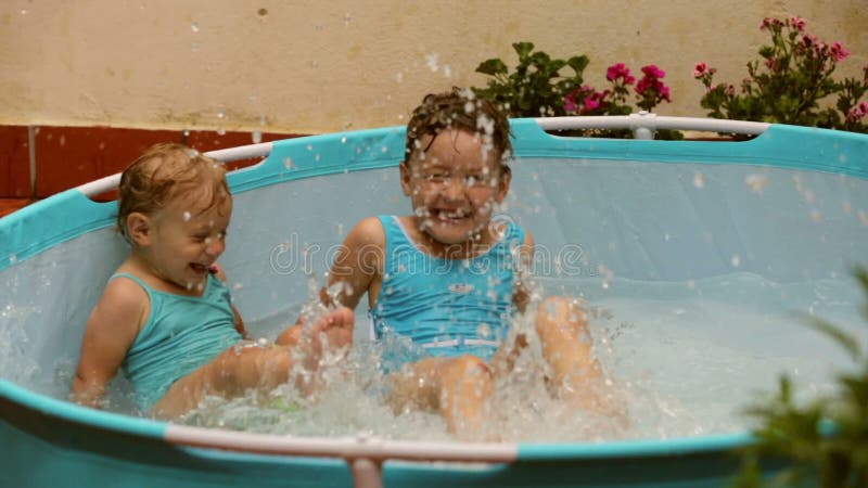 Children in Swimming Pool Having Fun during Family Summer Vacation ...