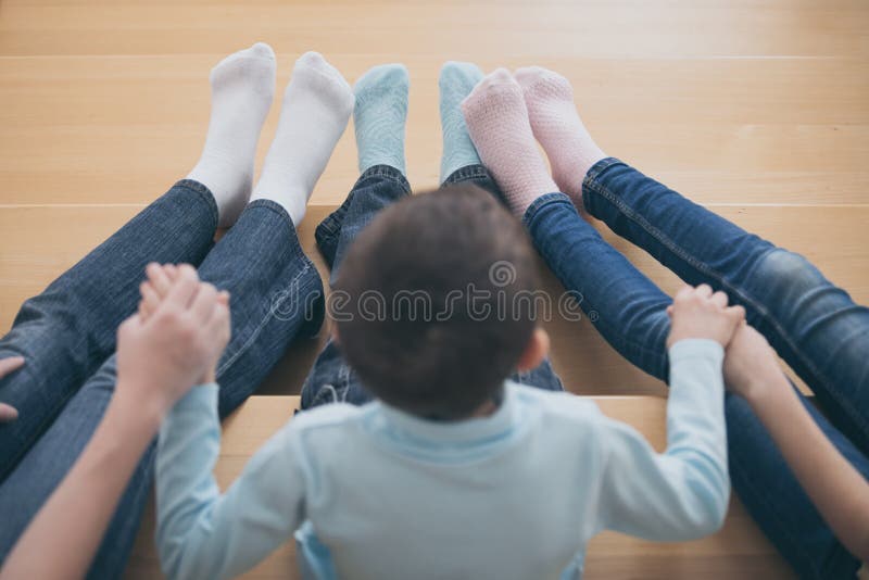 Happy Children Which are Sitting on the Stairs in the House. Stock ...