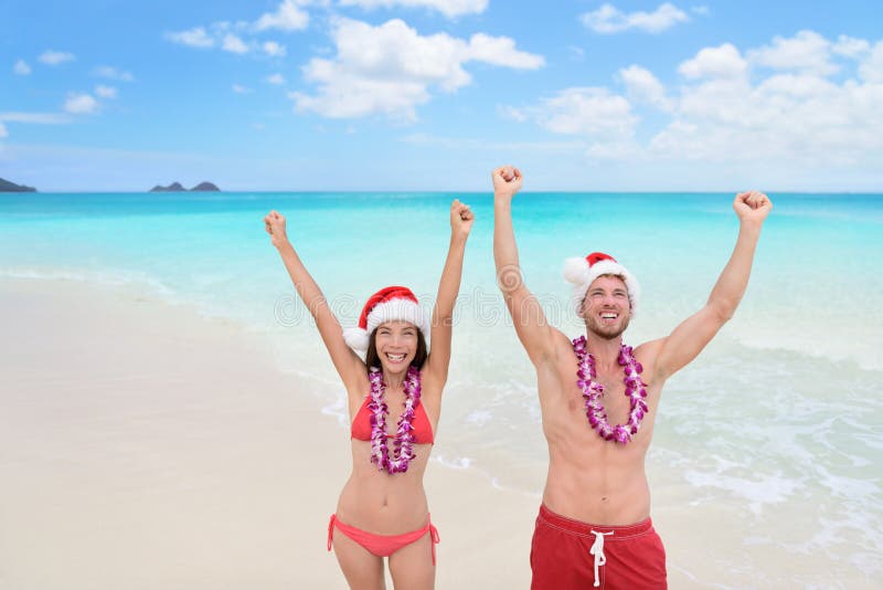 Happy Christmas holiday - couple on Hawaii beach