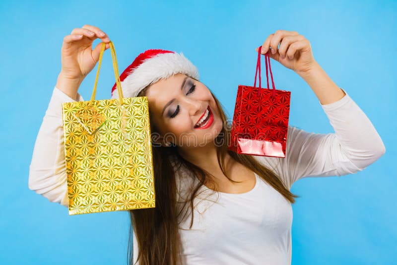 Happy Christmas woman holds gifts bag stock photo Happy Christmas woman holds gifts bag stock photo