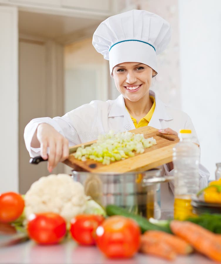 https://thumbs.dreamstime.com/b/happy-cook-woman-cooking-vegetarian-dinner-commercial-kitchen-29951230.jpg