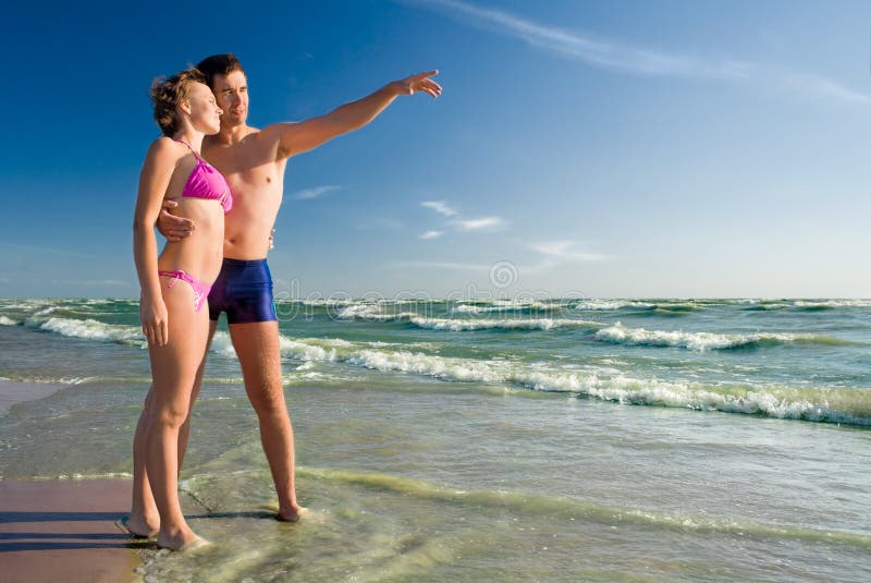 Happy couple on a beach-3 stock image