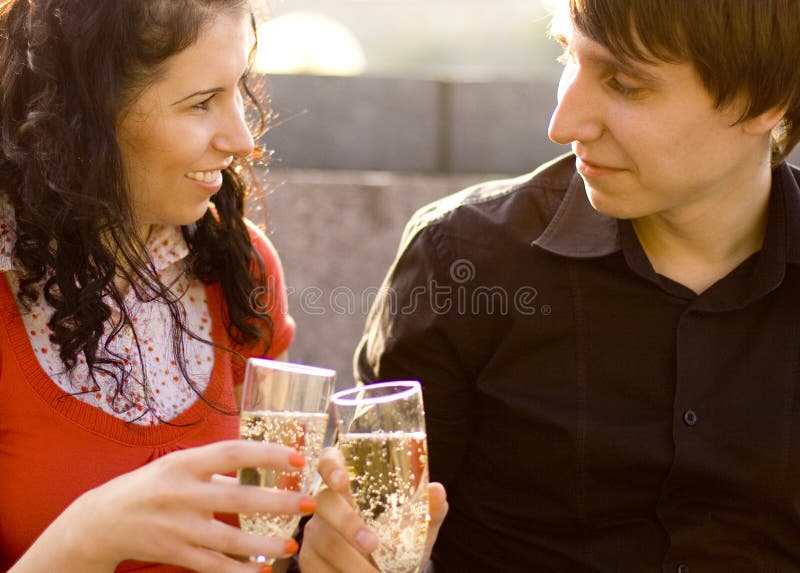 Happy couple with champagne