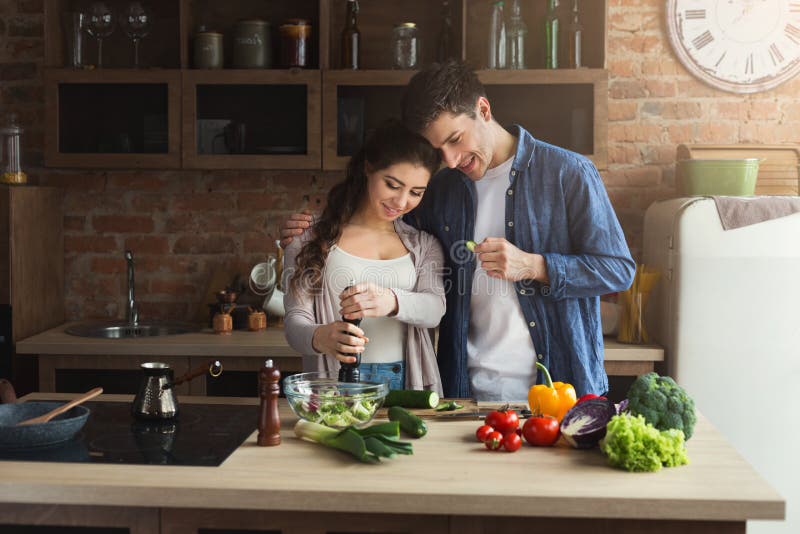 Happy Couple Cooking Healthy Food Together Stock Photo - Image of love