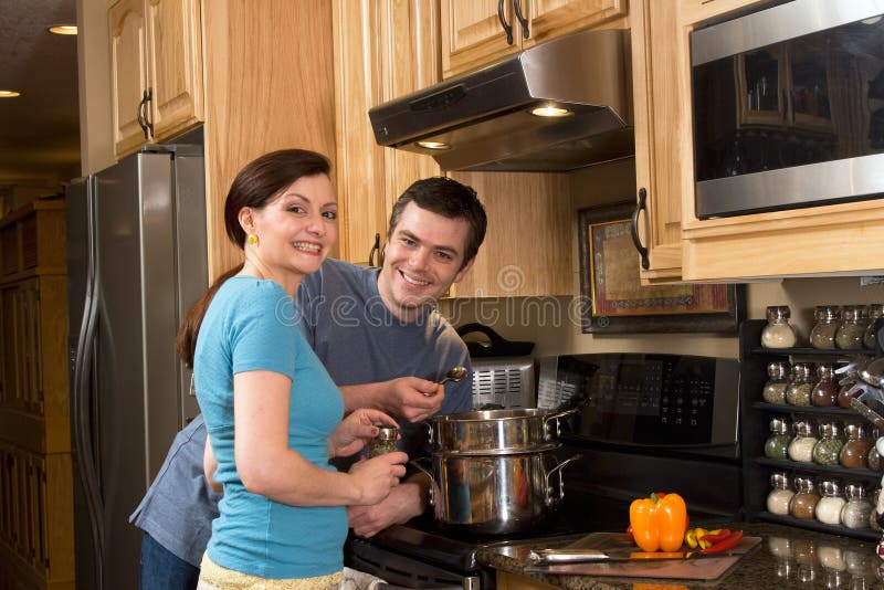 Happy Couple Cooking in the Kitchen - Horizontal