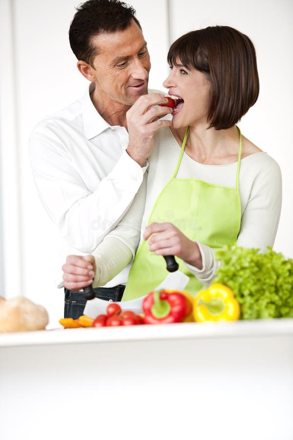 Happy Couple Cooking Together