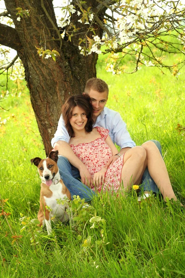 Happy couple with a dog