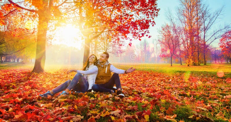 Happy Couple Enjoying The Fall Season stock photos Happy Couple Enjoying The Fall Season stock photos