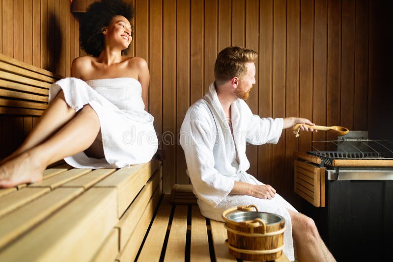 Happy Couple Having a Steam Bath in a Sauna Stock Photo - Image of ...