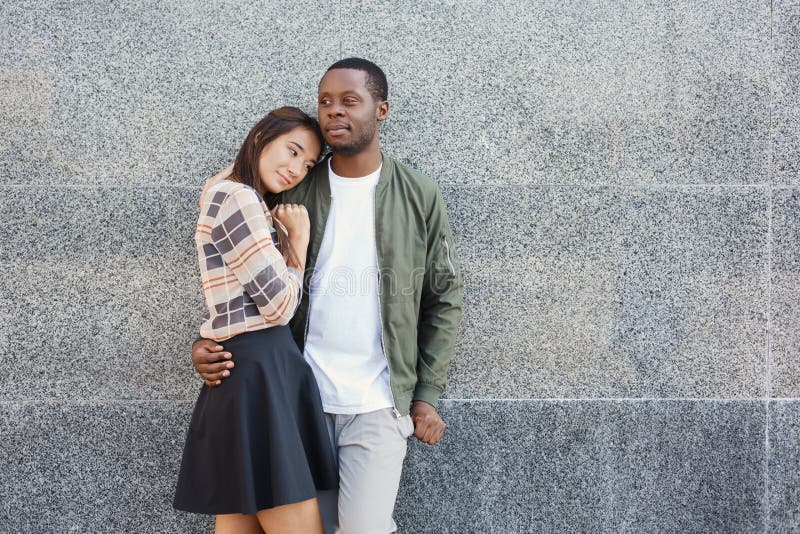 Happy couple hugging in city copy space royalty free stock image Happy couple hugging in city copy space royalty free stock image