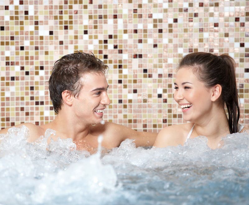 Couple Relaxing in Spa Jacuzzi. Stock Image Image of lovers