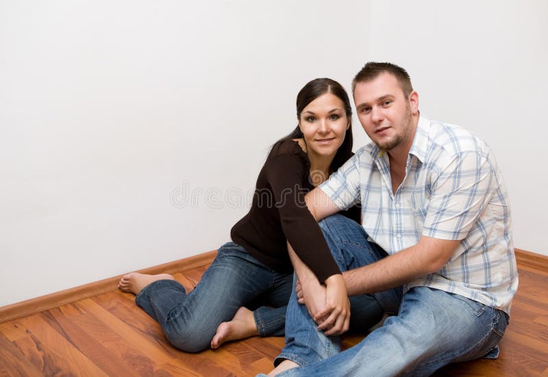 Happy couple at new home