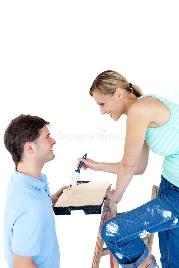 Happy Couple Painting a Room Stock Image Image of indoors, house