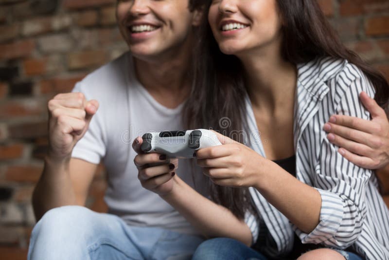 Free Photo  Girlfriend and boyfriend playing video games together at home