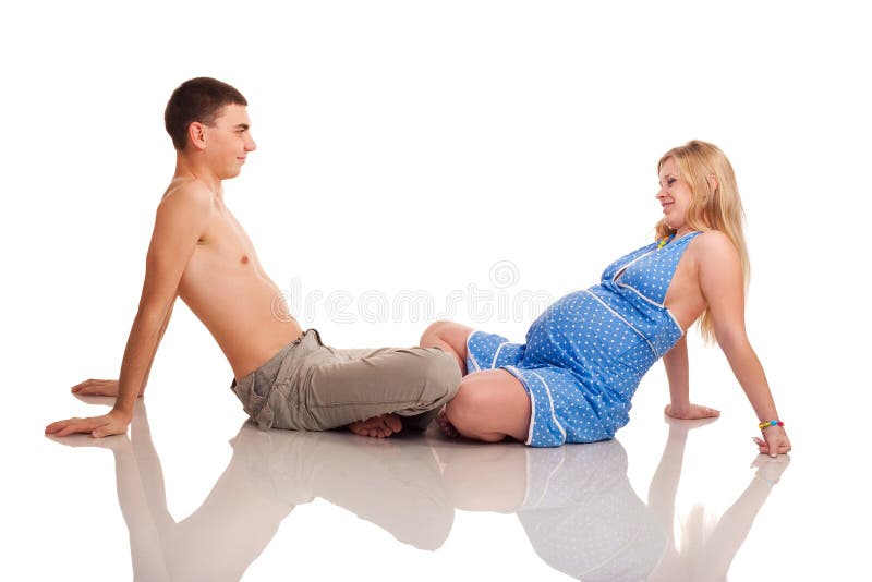 Happy couple - pregnant woman with her husband