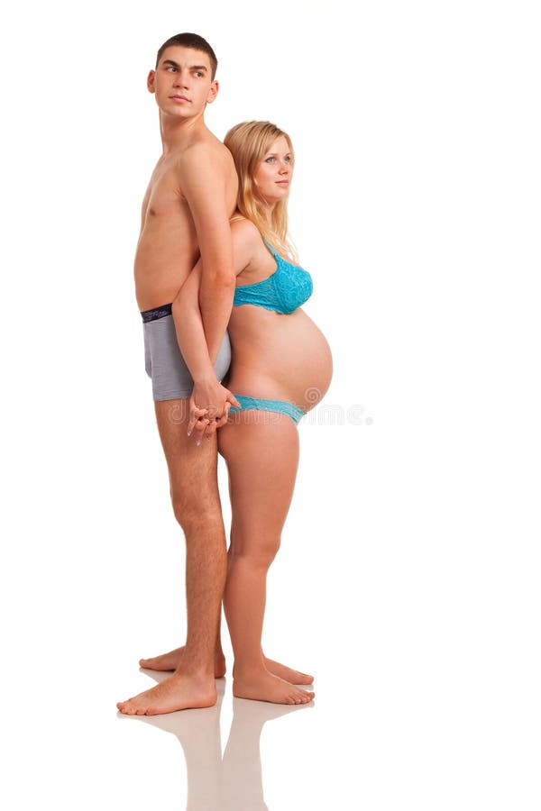 Happy couple - pregnant woman with her husband