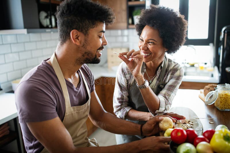 Happy Couple Preparing Healthy Food in Kitchen Stock Photo - Image of