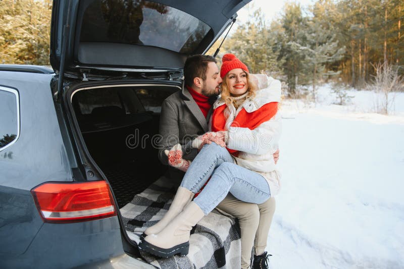 Happy Couple Sitting In Open Car Back Having Stop Off Romantic