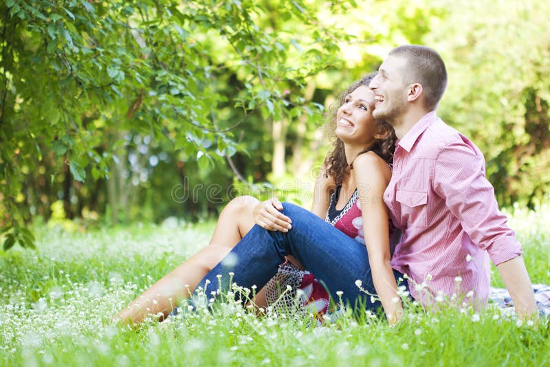 Happy couple in the spring park