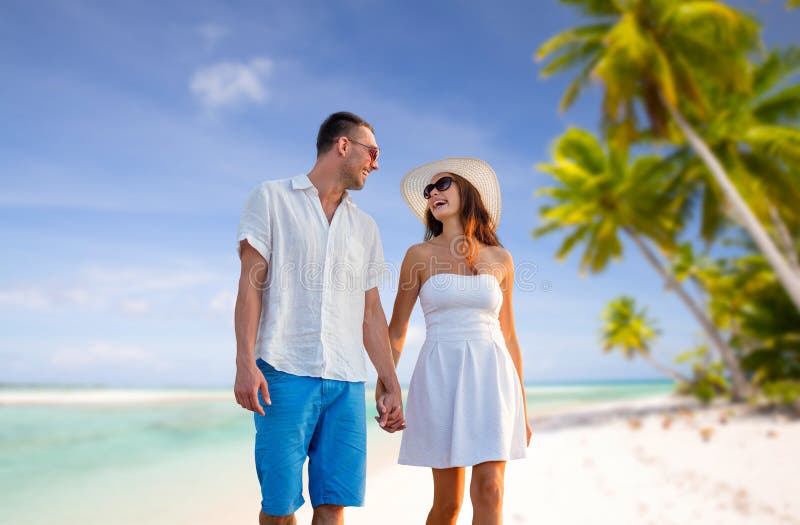 Happy Couple on Vacation Over Tropical Beach Stock Image - Image of