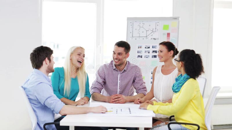 Happy creative team celebrating victory in office stock footage